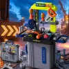 A grey TRAVEL box-style 3-in-1 toy tool set with a blue handle and travel logo, including a green workbench, an orange saw and a blue electric drill Specification image